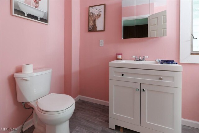625 W Church St, Orrville, OH 44667 - bathroom with vanity and wood finished floors