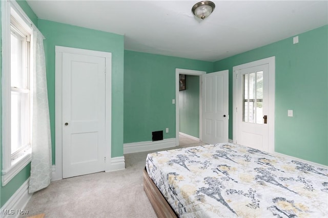 625 W Church St, Orrville, OH 44667 - carpeted bedroom with baseboards and a closet