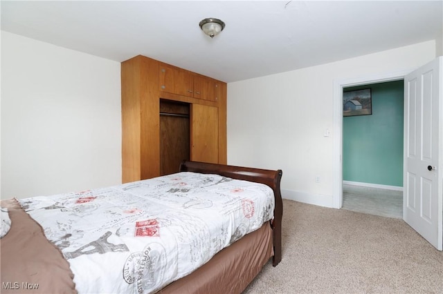 625 W Church St, Orrville, OH 44667 - bedroom featuring a closet and light colored carpet