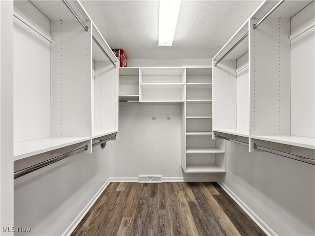 12147 Gladstone Rd SW, North Jackson, OH 44451 - spacious closet featuring dark wood-style floors