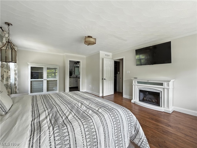12147 Gladstone Rd SW, North Jackson, OH 44451 - bedroom with wood finished floors, a high end fireplace, and ensuite bath