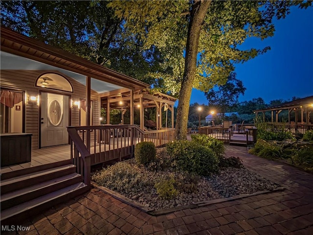 12147 Gladstone Rd SW, North Jackson, OH 44451 - view of deck at twilight