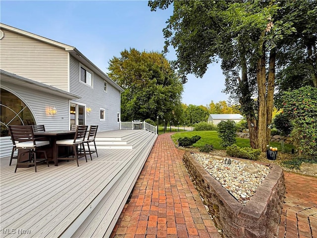 12147 Gladstone Rd SW, North Jackson, OH 44451 - wooden deck featuring outdoor dining space