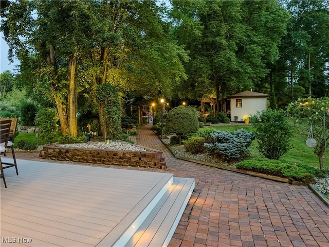 12147 Gladstone Rd SW, North Jackson, OH 44451 - view of patio / terrace with a deck and an outbuilding