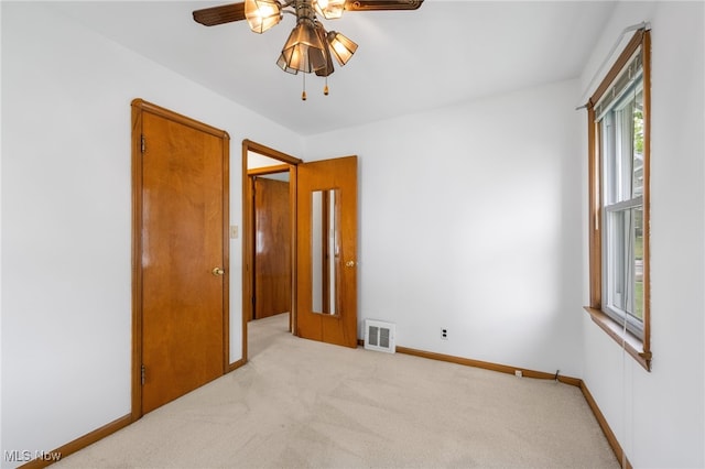 15617 Rockside Rd, Maple Heights, OH 44137 - spare room featuring a ceiling fan and light colored carpet
