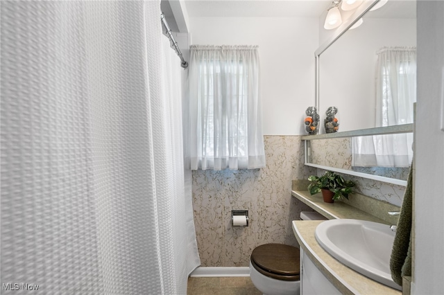 15617 Rockside Rd, Maple Heights, OH 44137 - bathroom with vanity, tile patterned flooring, and a shower with shower curtain