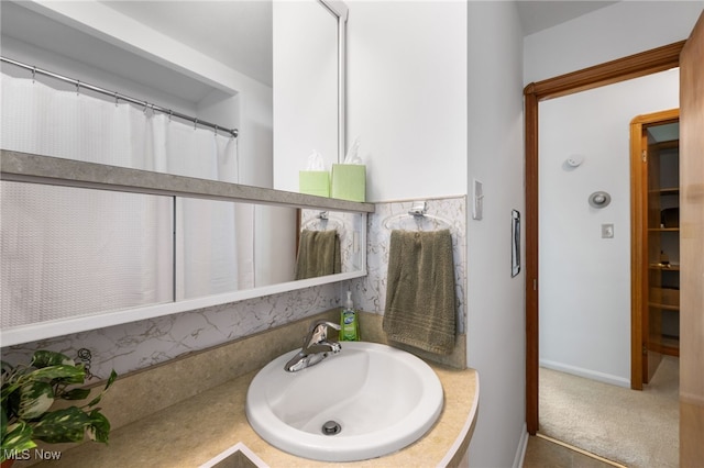 15617 Rockside Rd, Maple Heights, OH 44137 - bathroom featuring vanity and baseboards