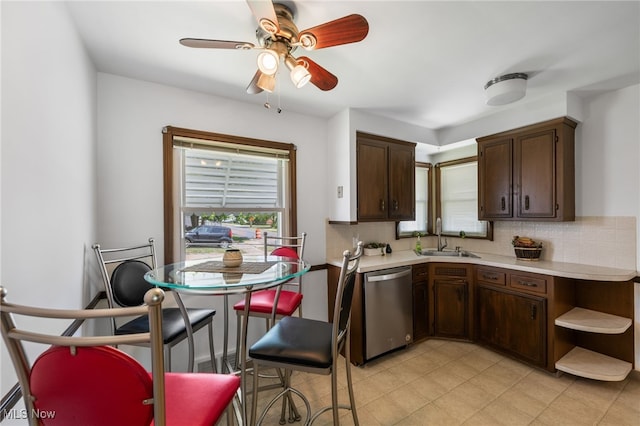15617 Rockside Rd, Maple Heights, OH 44137 - kitchen with dishwasher, backsplash, light countertops, and dark brown cabinets