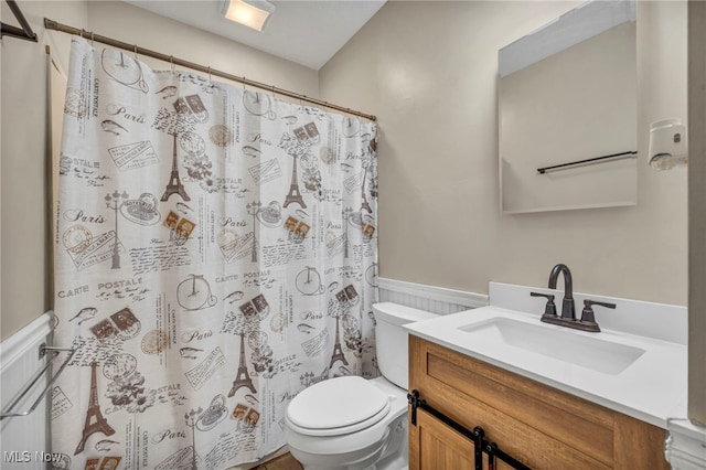 1425 Keefer Rd, Girard, OH 44420 - bathroom featuring a wainscoted wall, vanity, and a shower with curtain