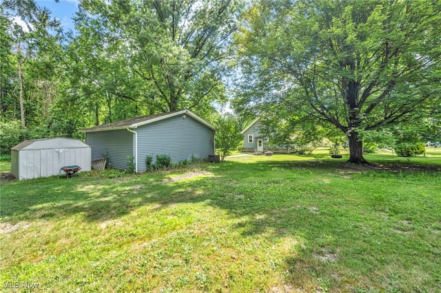 1425 Keefer Rd, Girard, OH 44420 - view of green lawn featuring a storage unit