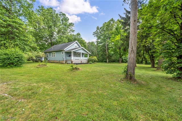 1425 Keefer Rd, Girard, OH 44420 - view of green lawn featuring a porch