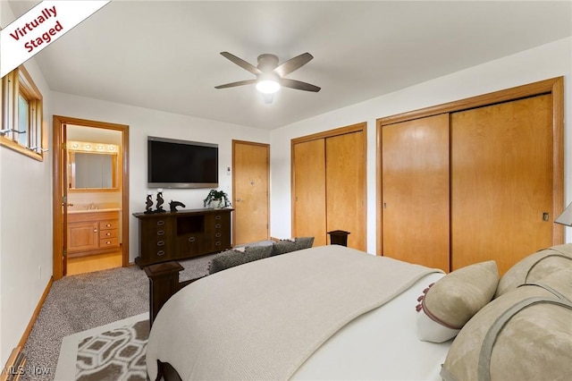 853 Almasy Dr, Campbell, OH 44405 - bedroom with two closets, carpet floors, ensuite bath, and ceiling fan