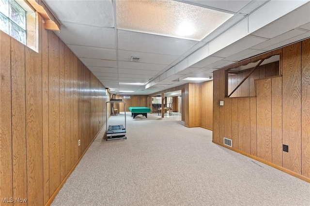 853 Almasy Dr, Campbell, OH 44405 - hallway featuring wooden walls, carpet, and a paneled ceiling
