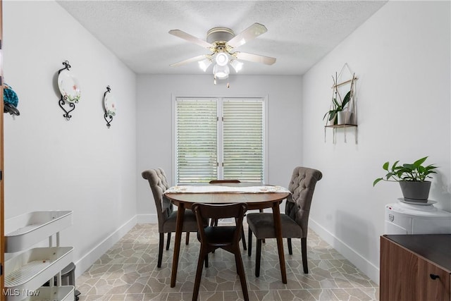 2715 Eastwood Dr, Wooster, OH 44691 - dining space featuring ceiling fan and a textured ceiling