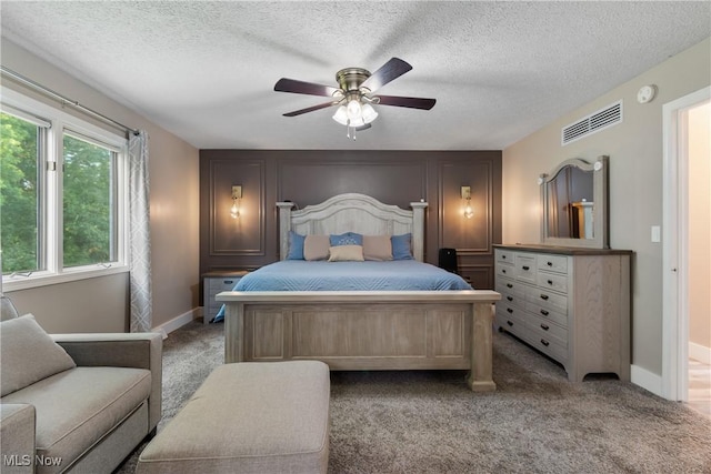 2715 Eastwood Dr, Wooster, OH 44691 - bedroom with light colored carpet, ceiling fan, and a textured ceiling