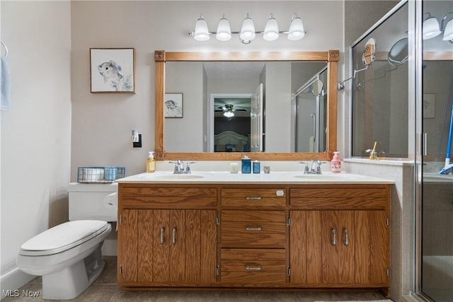 2715 Eastwood Dr, Wooster, OH 44691 - full bathroom with double vanity, a shower stall, and a ceiling fan