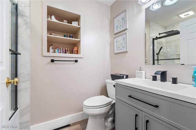 2715 Eastwood Dr, Wooster, OH 44691 - full bathroom with vanity, a marble finish shower, and wood finished floors