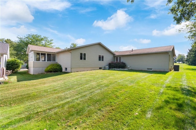 2715 Eastwood Dr, Wooster, OH 44691 - rear view of house with a lawn