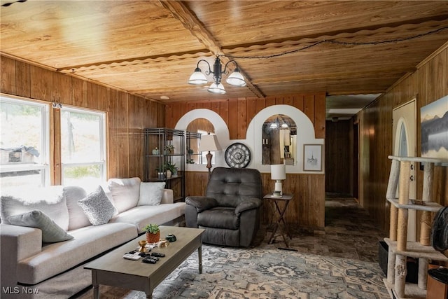 2361 Carpenter Run Rd, Waverly, WV 26184 - living area with wood ceiling, wooden walls, arched walkways, and a chandelier