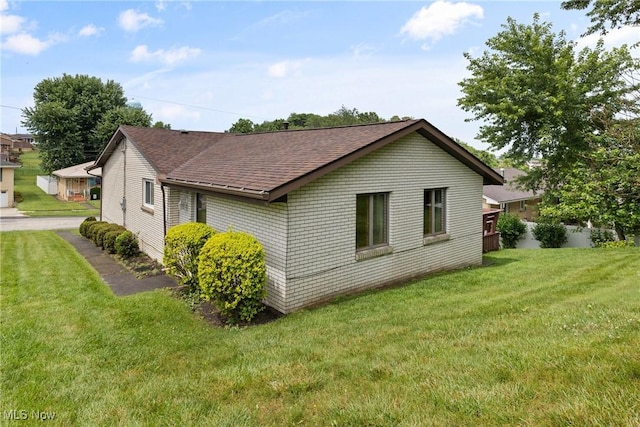 4134 Brightway St, Weirton, WV 26062 - view of property exterior featuring roof with shingles and a yard