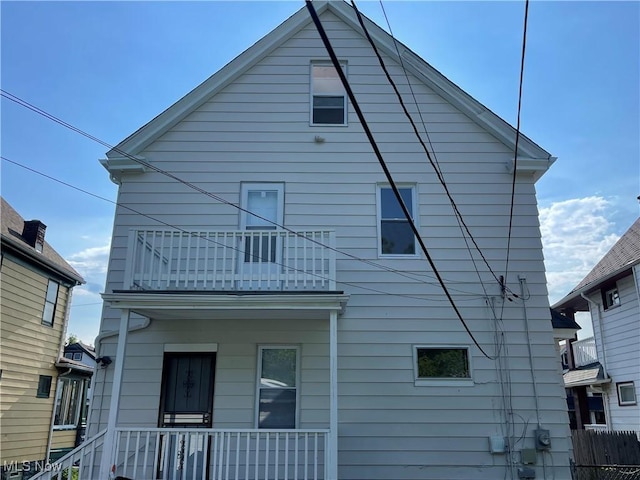 3363 E 125th St, Cleveland, OH 44120 - rear view of house featuring a balcony and a porch