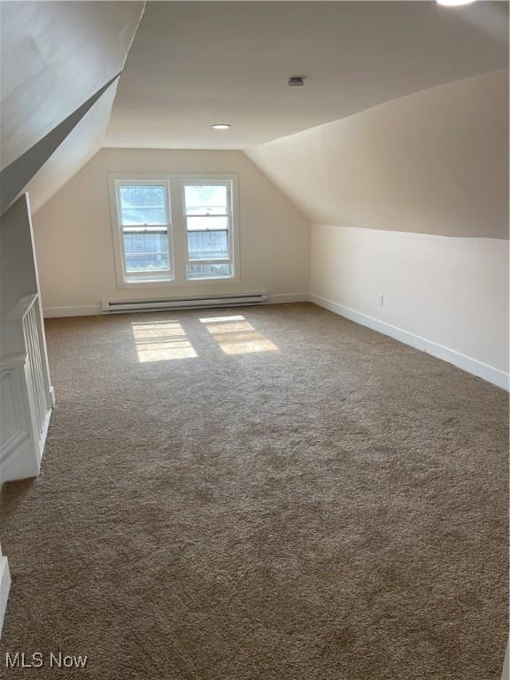 3363 E 125th St, Cleveland, OH 44120 - bonus room with baseboard heating, vaulted ceiling, and carpet flooring