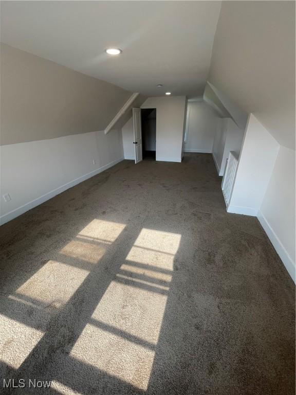 3363 E 125th St, Cleveland, OH 44120 - bonus room with dark carpet, lofted ceiling, and recessed lighting
