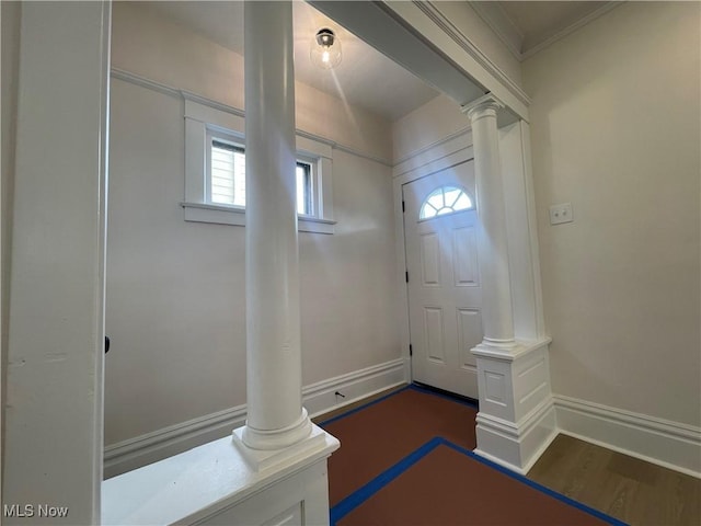 3363 E 125th St, Cleveland, OH 44120 - entrance foyer featuring ornate columns, dark wood finished floors, and ornamental molding