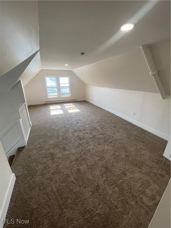 3363 E 125th St, Cleveland, OH 44120 - additional living space with lofted ceiling, carpet, and baseboard heating