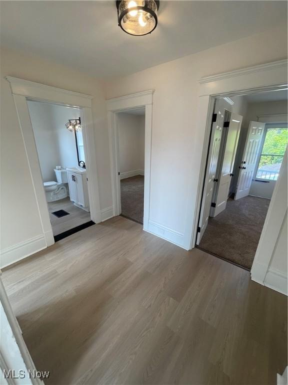 3363 E 125th St, Cleveland, OH 44120 - unfurnished dining area featuring wood finished floors and baseboards