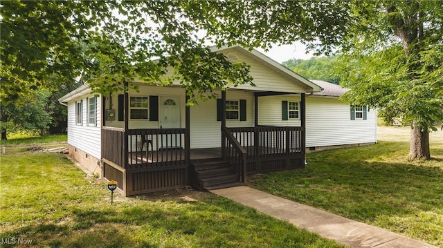 3917 Walker Rd, Walker, WV 26180 - view of front facade featuring crawl space, a front yard, and covered porch