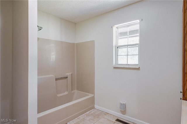 3917 Walker Rd, Walker, WV 26180 - bathroom featuring tile patterned flooring and tub / shower combination