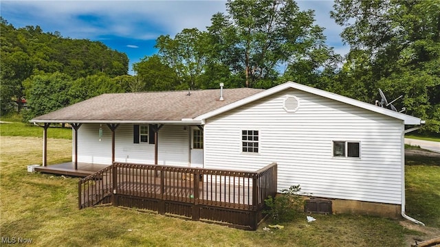 3917 Walker Rd, Walker, WV 26180 - back of house with a lawn and a shingled roof