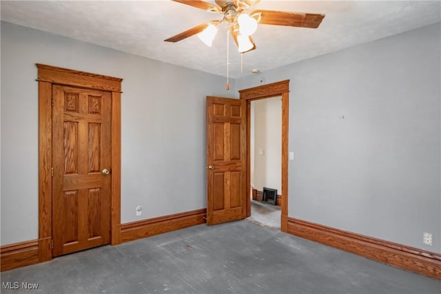 1407 Andrew St, Parkersburg, WV 26101 - empty room with a ceiling fan and baseboards
