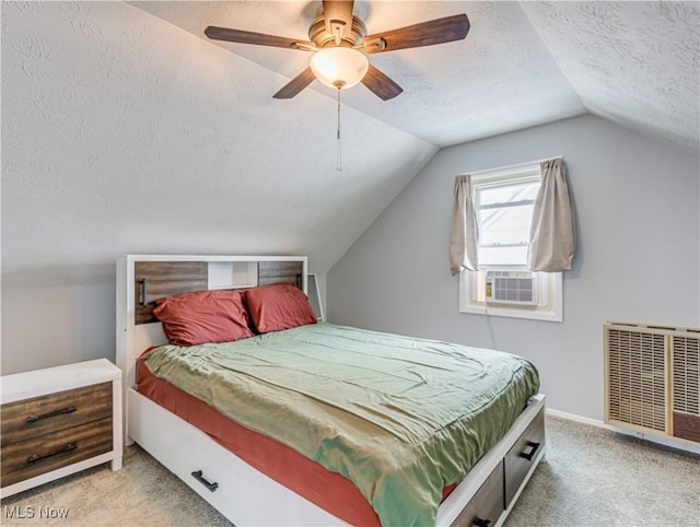 14507 Reddington Ave, Maple Heights, OH 44137 - bedroom with a textured ceiling, carpet, lofted ceiling, a ceiling fan, and radiator