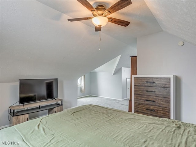 14507 Reddington Ave, Maple Heights, OH 44137 - carpeted bedroom with vaulted ceiling, a textured ceiling, and ceiling fan
