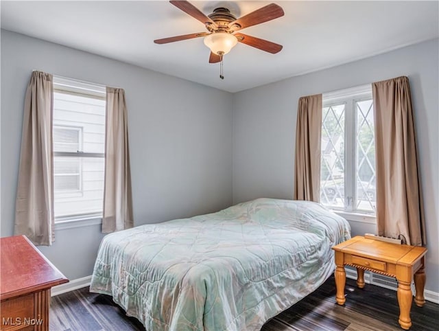 14507 Reddington Ave, Maple Heights, OH 44137 - bedroom featuring dark wood-style flooring and a ceiling fan