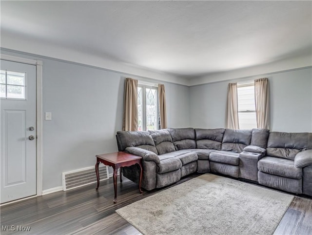 14507 Reddington Ave, Maple Heights, OH 44137 - living area featuring healthy amount of natural light and dark wood-style floors