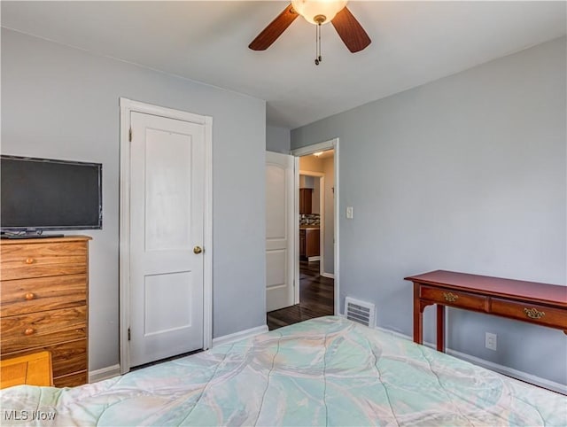 14507 Reddington Ave, Maple Heights, OH 44137 - bedroom with a ceiling fan and wood finished floors