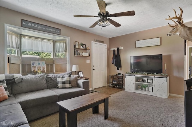 1300 Andrew Ave, Salem, OH 44460 - carpeted living room featuring ceiling fan and a textured ceiling