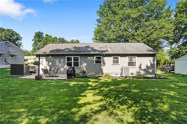 1300 Andrew Ave, Salem, OH 44460 - rear view of property featuring a lawn and a patio