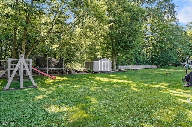 1300 Andrew Ave, Salem, OH 44460 - view of yard featuring a trampoline and a shed