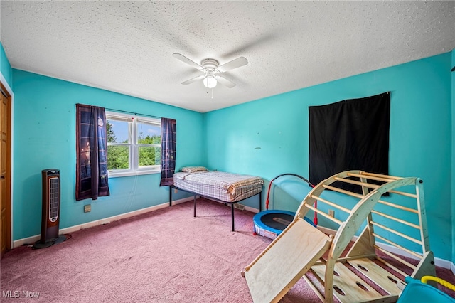 5050 Middle Rd, Conneaut, OH 44030 - carpeted bedroom with a textured ceiling and ceiling fan