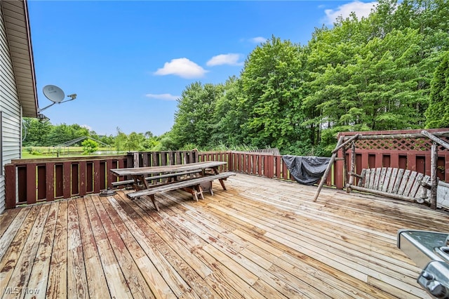 5050 Middle Rd, Conneaut, OH 44030 - wooden terrace with outdoor dining area