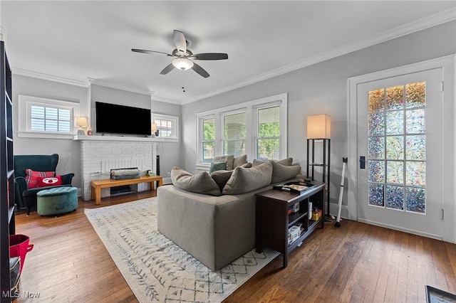 14317-14319 Bayes Ave, Lakewood, OH 44107 - living room featuring a ceiling fan, hardwood / wood-style flooring, a fireplace, and ornamental molding