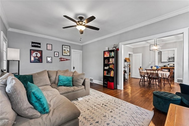 14317-14319 Bayes Ave, Lakewood, OH 44107 - living area with a ceiling fan, dark wood-type flooring, and ornamental molding