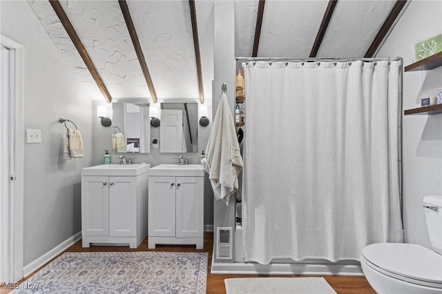14317-14319 Bayes Ave, Lakewood, OH 44107 - full bathroom featuring vanity, wood finished floors, and shower / tub combo with curtain