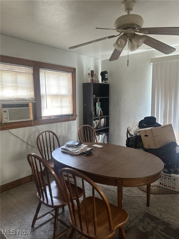 1720 Spring St, Parkersburg, WV 26101 - dining room with a textured wall, a ceiling fan, cooling unit, and a textured ceiling