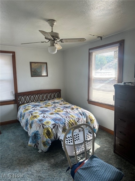 1720 Spring St, Parkersburg, WV 26101 - bedroom featuring carpet floors, a ceiling fan, and a textured ceiling