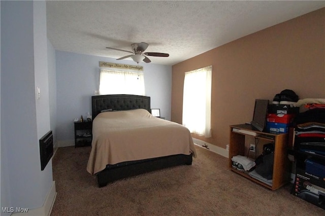 45 Mechanic St, Berlin Heights, OH 44814 - carpeted bedroom featuring ceiling fan and a textured ceiling